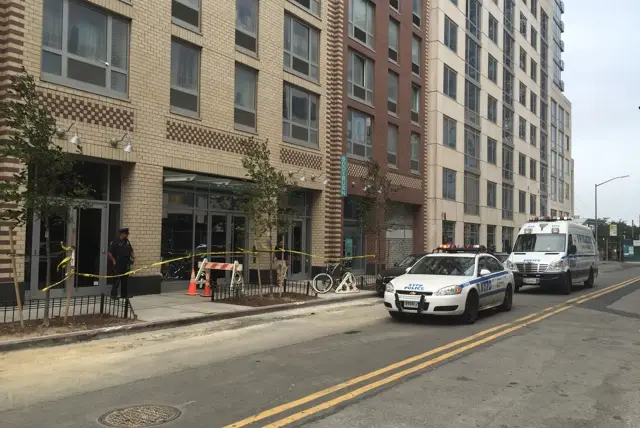 Police outside an apartment building